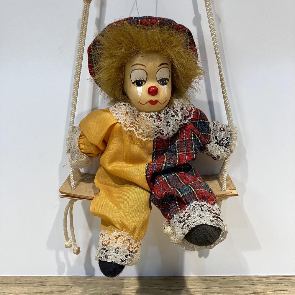 Porcelain Clown on Wooden Swing 1980s Harlequin Marionette Plaid Yellow Circus